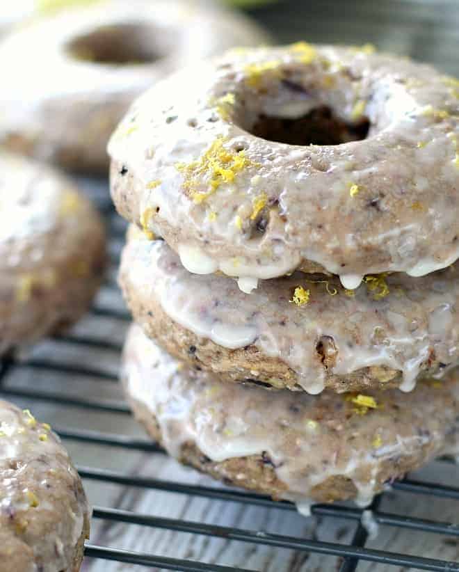 Blueberry Lemon Chia Doughnuts stacked on wire rack