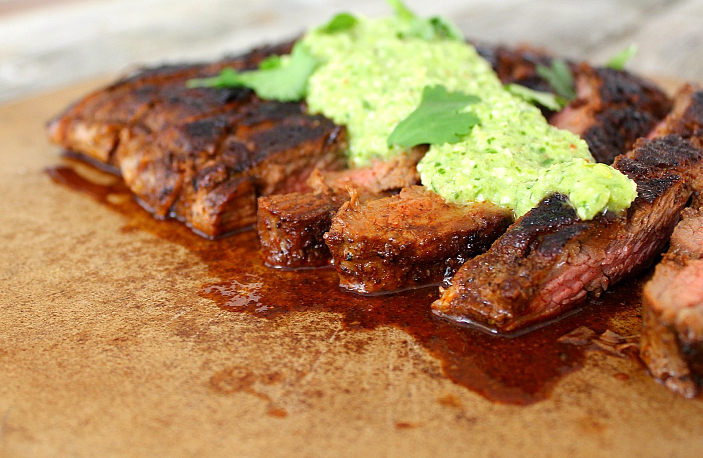 Flank steak with espresso rub and green chile pesto is full of flavor, ready in just 30 minutes. Tender and juicy, guaranteed.
