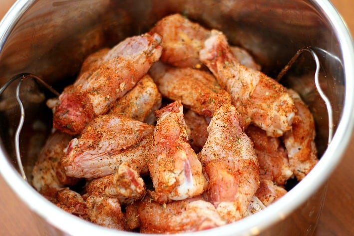 chicken wings seasoned and ready to cook in pressure cooker