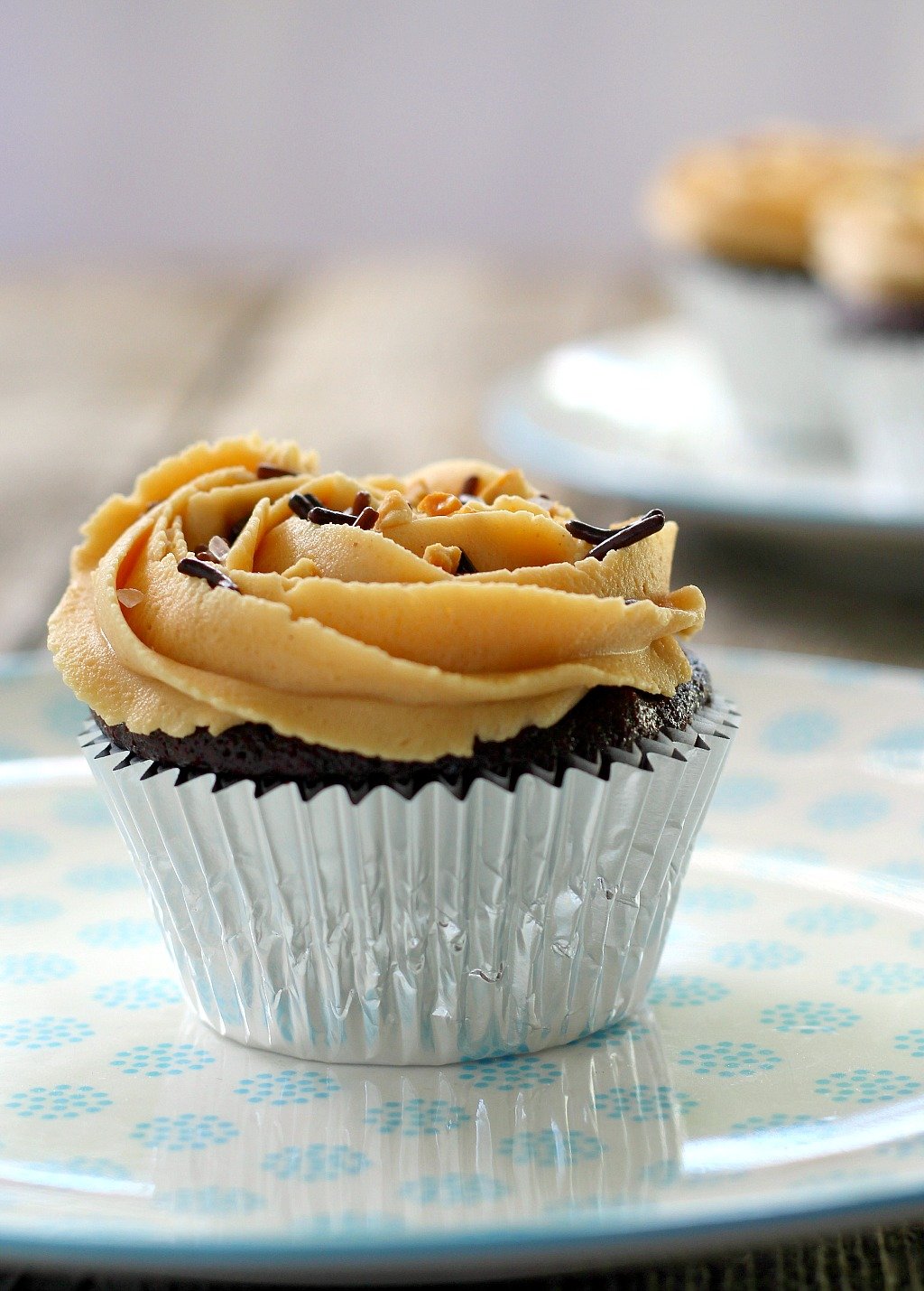 Chocolate Coca-Cola Cupcakes with Peanut Butter Buttercream Frosting are quick and easy, with intense chocolate and peanut butter flavor.