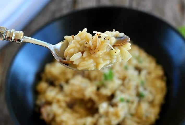 Mushroom risotto on a fork