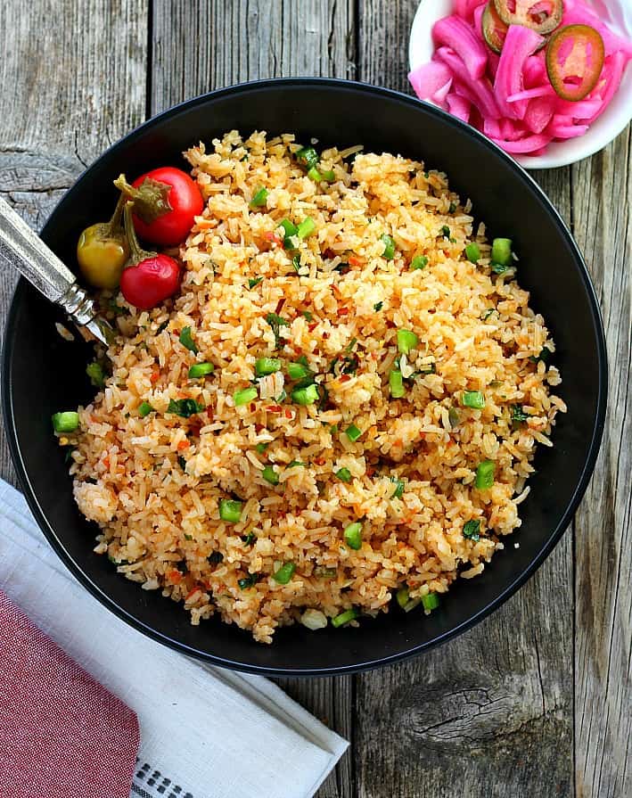 Classic Mexican Rice is traditional and flavorful. Perfect for any Mexican menu, the flavors get even better over time if you want to make it in advance but easy enough to make anytime.