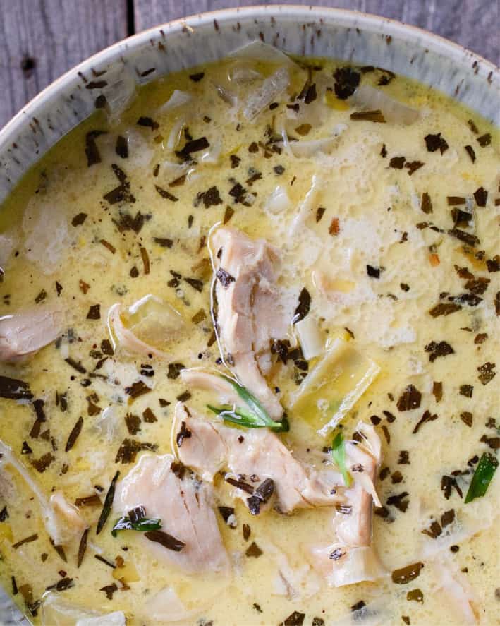 chicken tarragon soup in grey bowl