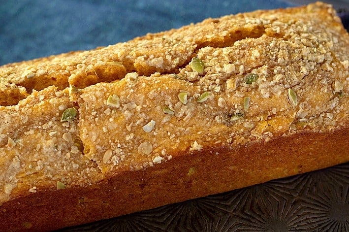close up of whole apricot pumpkin bread loaf