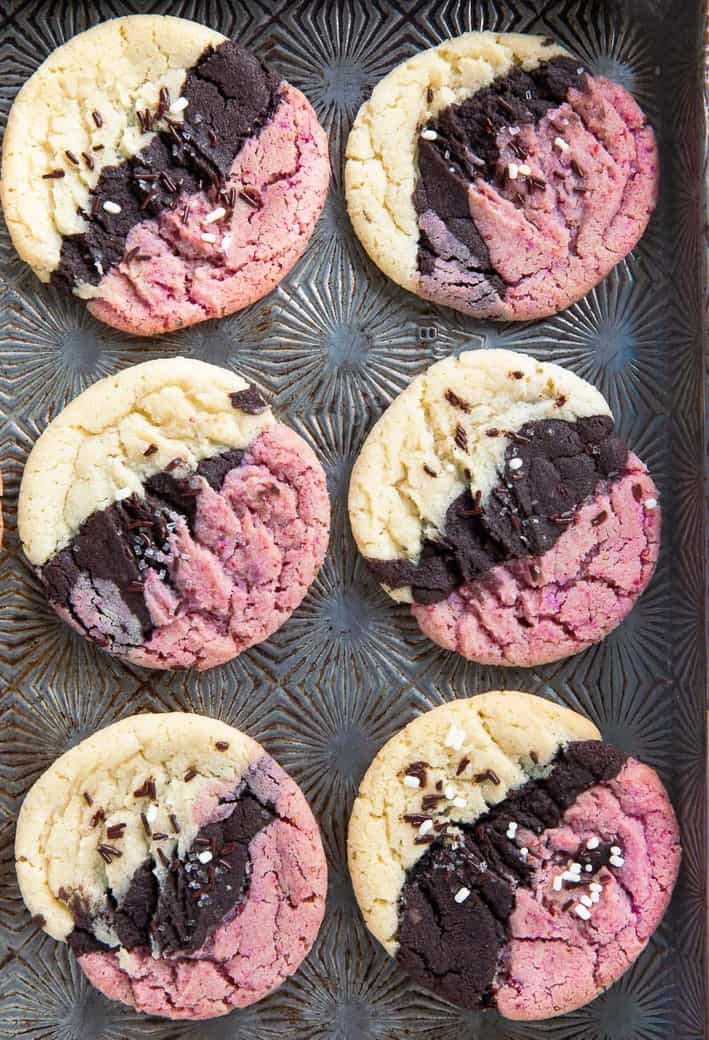Neapolitan cookies lined up on a baking sheet