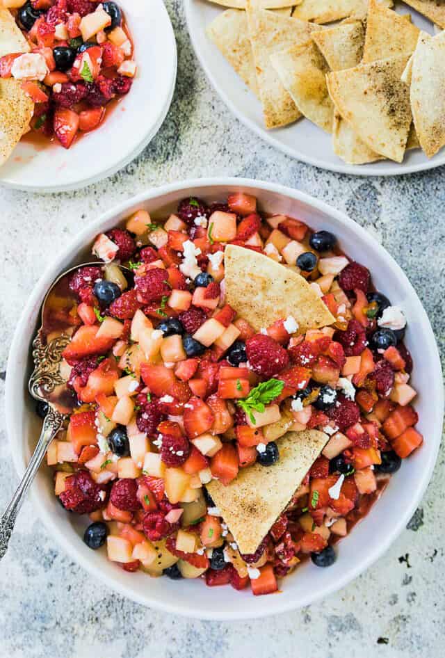Fruit salsa and churro chips in bowls