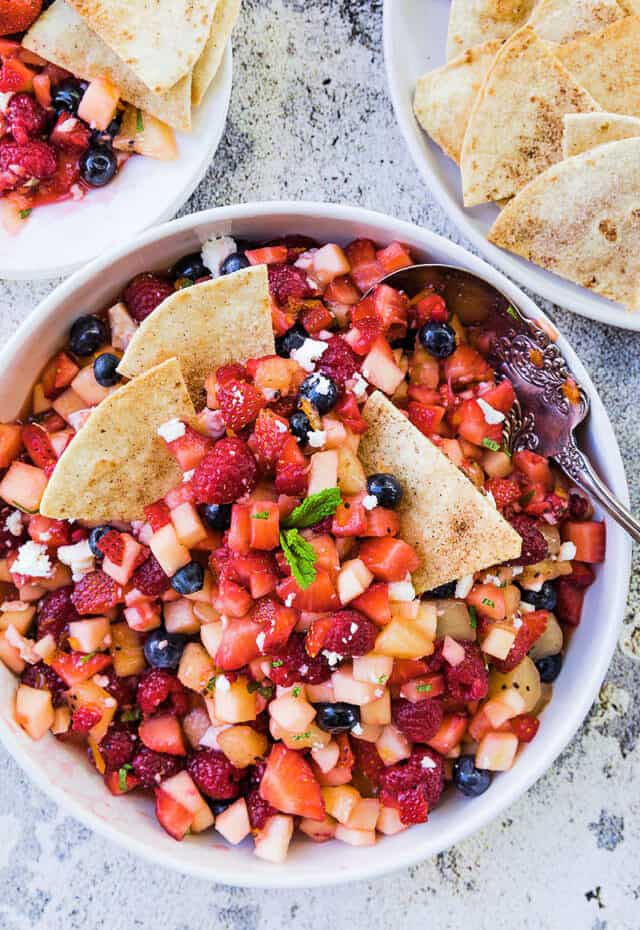 fruit salsa in bowl with churro chips on side
