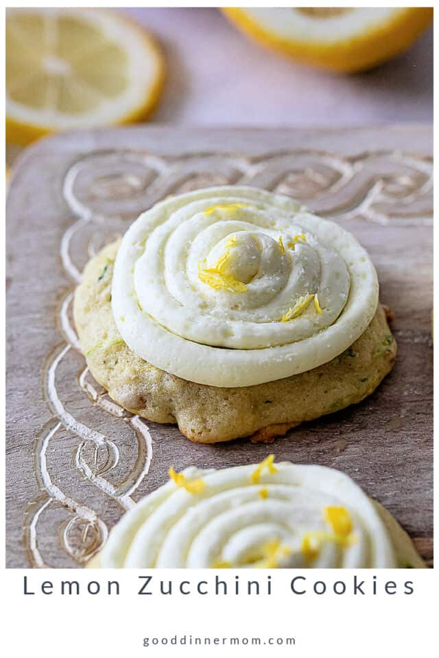 Close up of lemon zucchini cookies with buttercream frosting and lemon zest. Text below says Lemon Zucchini Cookies by good dinner mom