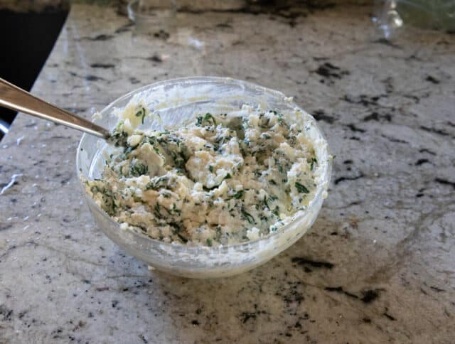 ricotta, with chopped spinach in a bowl