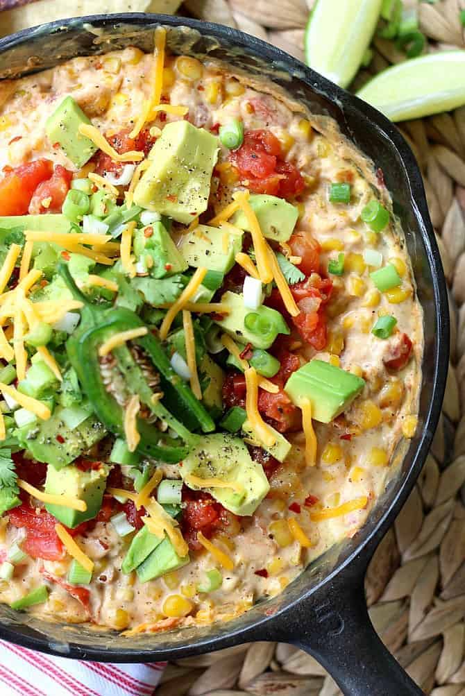 Closeup of Hot Corn Dip in a black mini skillet