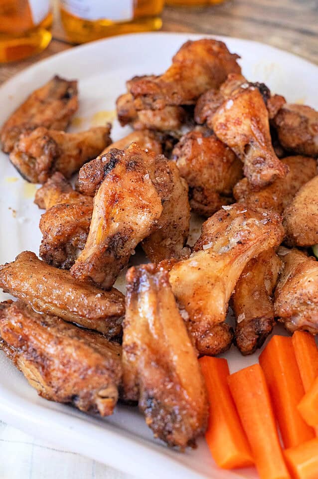 Closeup of salt and vinegar chicken wings on a platter.