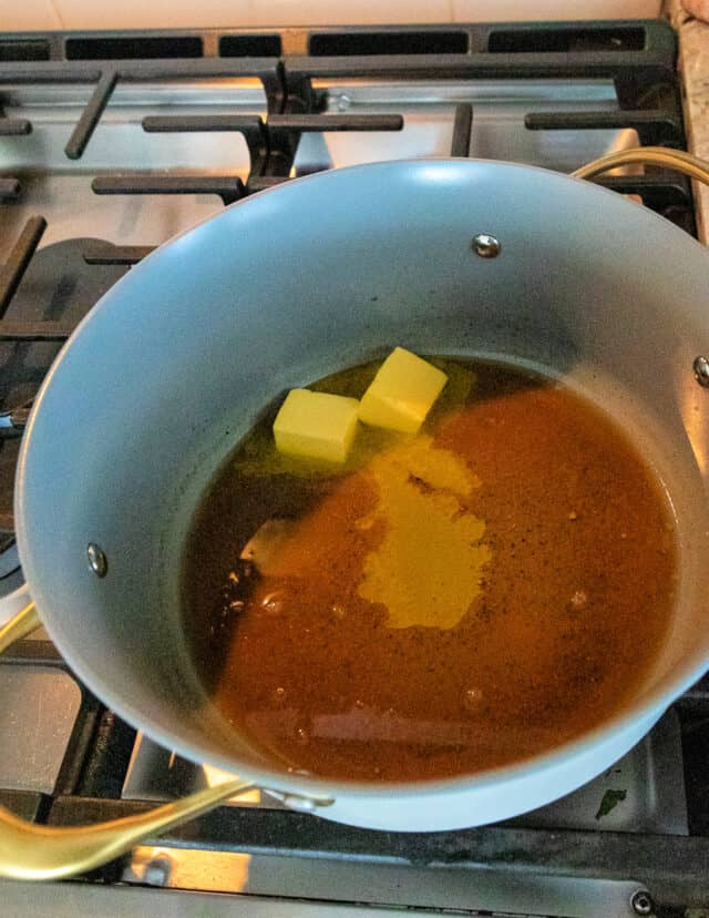 Vinegars, salt, sugar, pepper, garlic powder reduction with butter added.