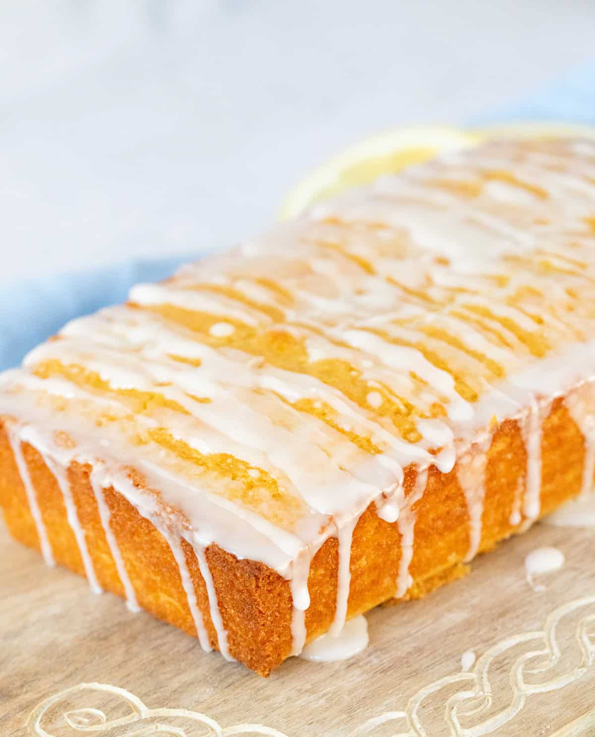 Lemon loaf on a cutting board.