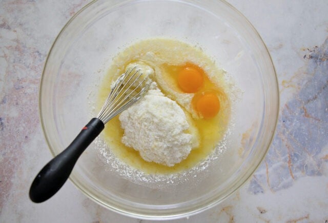 Lemon sugar mixture and eggs.