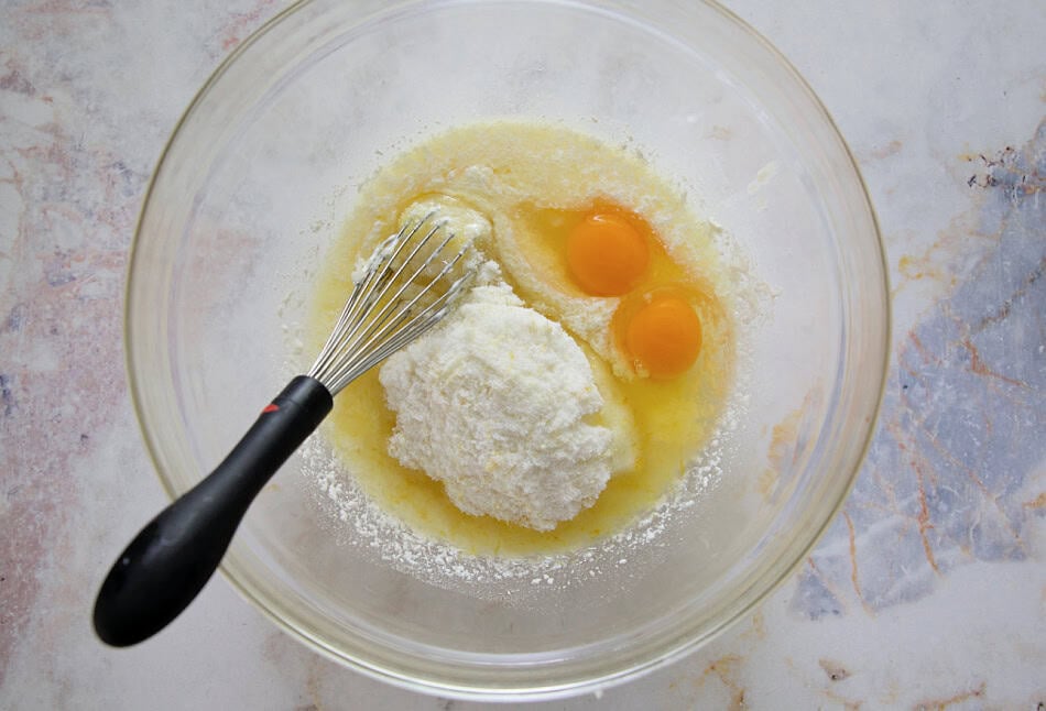 Lemon sugar mixture and eggs.