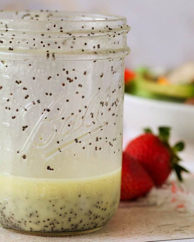 Easy homemade poppy seed dressing in jar.