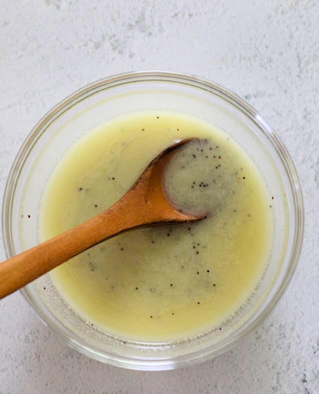 Poppy seed dressing after all ingredients have been added and stirred.