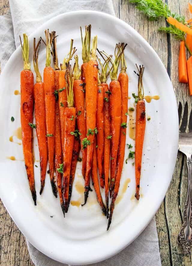 Roasted carrots on plate.