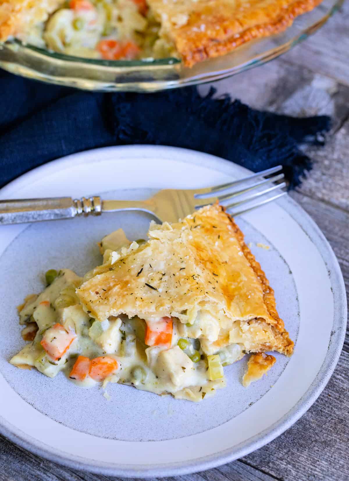 Slice of chicken pot pie on plate.