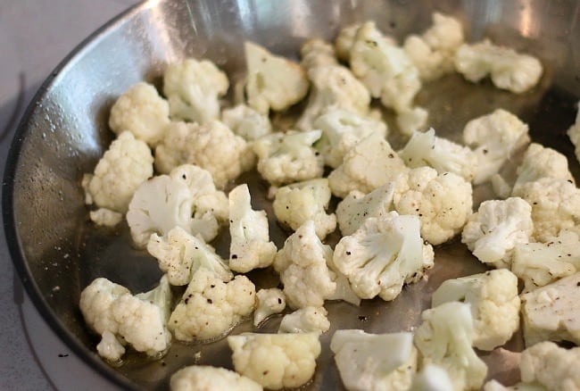 Cauliflower in pan before seasoned