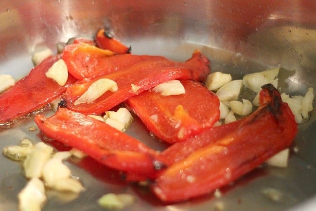 Peppers and garlic in pan