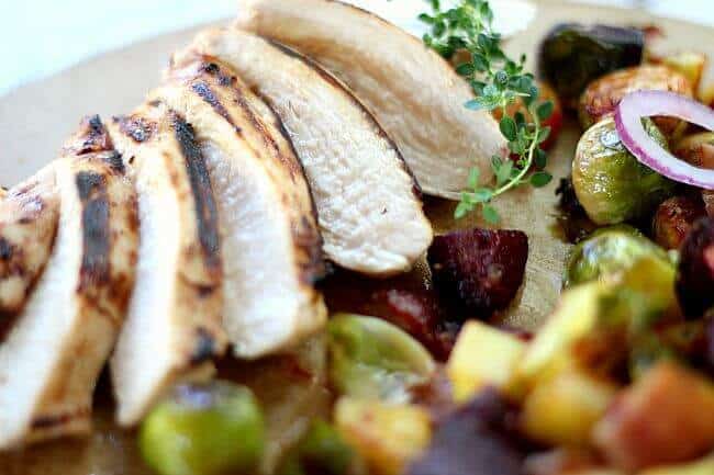 Citrus Marinated Chicken Breasts sliced with brussel sprouts, beets, potatoes.