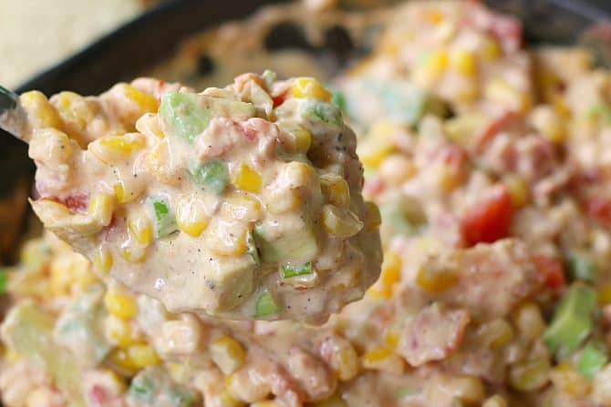Close up of Hot Corn Dip on a spoon