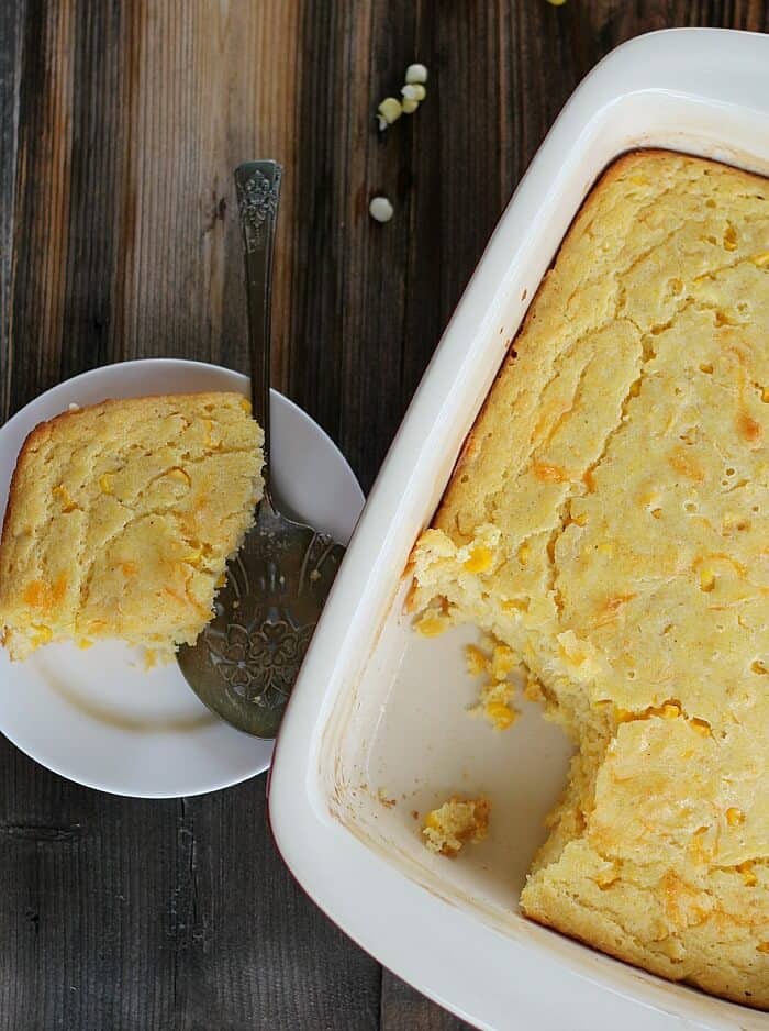 quick corn spoon bread in serving dish and on plate with serving spoon