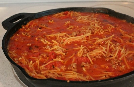 Skillet Spaghetti in a skillet ready to bake