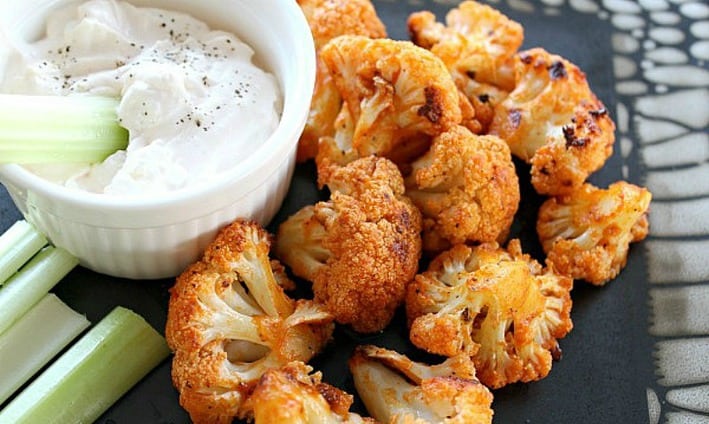 cauliflower buffalo bites with celery and blue cheese dip