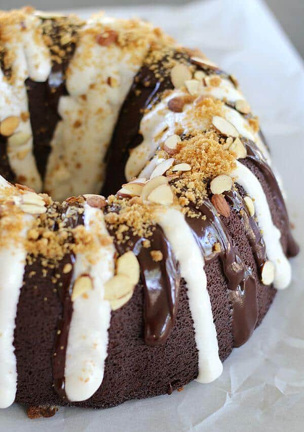 Chocolate S'mores Bundt Cake starts with a delicious, moist sour cream chocolate cake and builds from there with chocolate ganache and marshmallow cream.