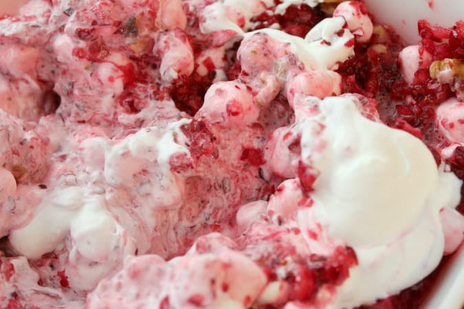Cranberries, marshmallows mixed with whipped cream 