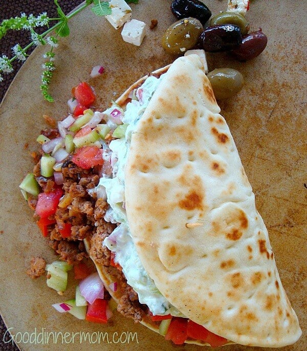 Big Fat Greek Tacos will please every appetite, ground meat seasoned perfectly and served with tomato and cucumber relish with mint tzatziki.
