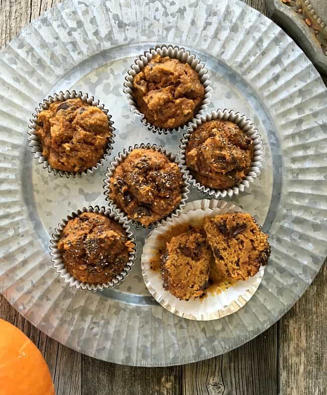 These pumpkin muffins are made with dark chocolate, coconut oil, chia seeds and of course, pumpkin puree. Substitute walnuts for the chocolate if desired.