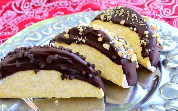  Tacos dipped in chocolate on a silver plate