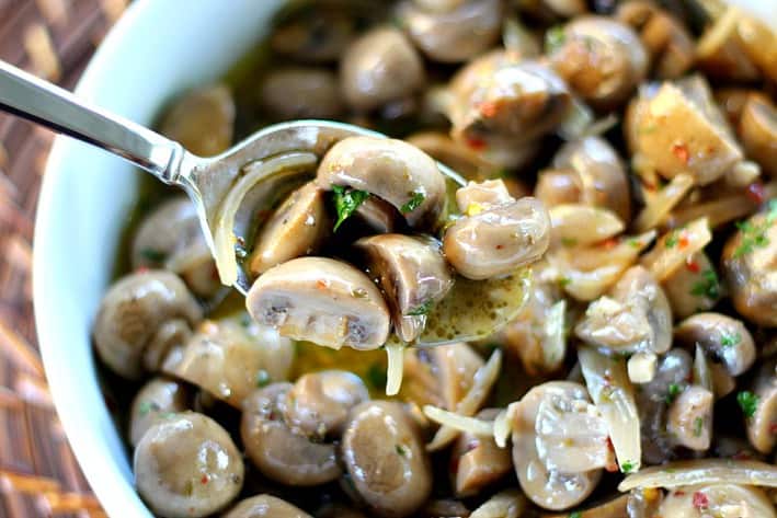 Marinated Mushrooms up close with a spoon