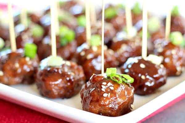 Slow Cooker Party Meatballs in Raspberry Balsamic Glaze are easy and flavorful. Included is a simple recipe for basic meatballs, or use packaged, frozen.