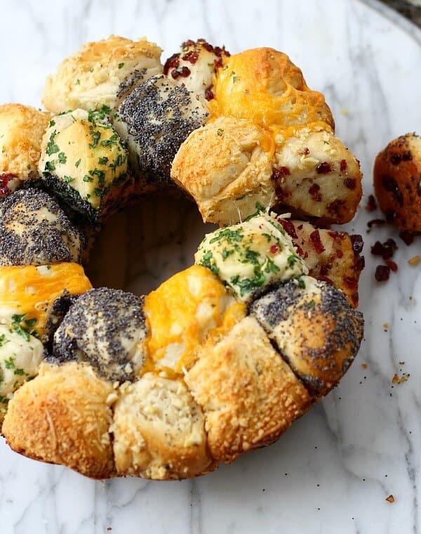 Incredible Savory Monkey Bread is also incredibly easy monkey bread. Buttery and flavorful, using refrigerated canister biscuits and any herb and cheese combination that fits your menu.