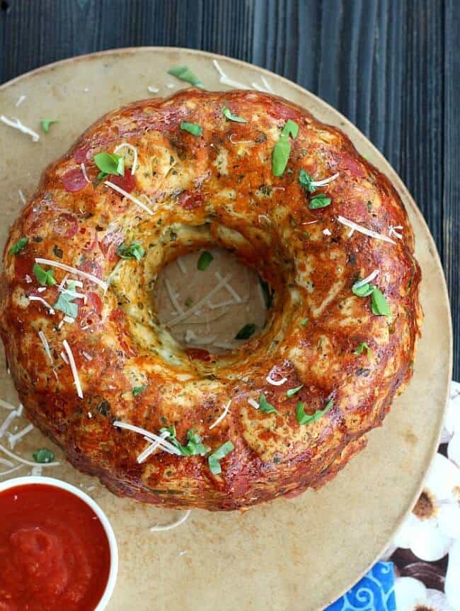 Here's a sure hit for your next party. Pull Apart Cheesy Pizza Bread is ready in 30 minutes and is a fun alternative to take out pizza.