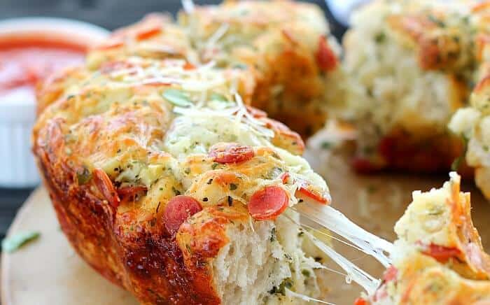 Here's a sure hit for your next party. Pull Apart Pizza Bread is ready in 30 minutes and is a fun alternative to take out pizza.