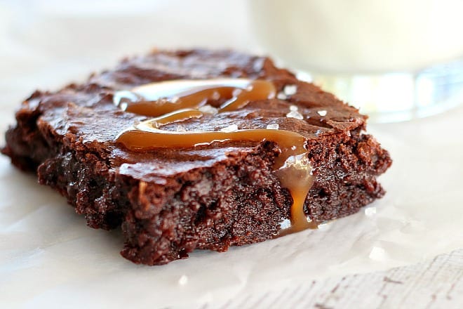 One serving of a Salted Caramel Brownies on parchment