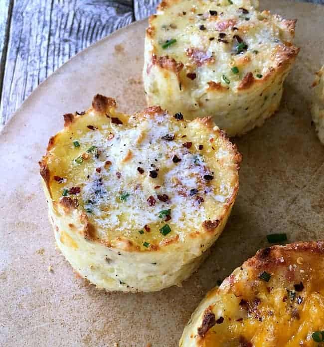 Baked Mashed Potato Cakes look fancy and taste amazing! Delicious for any traditional meat-and-potatoes menu, but excellent by themselves or made ahead to pack into lunches or serve at breakfast.