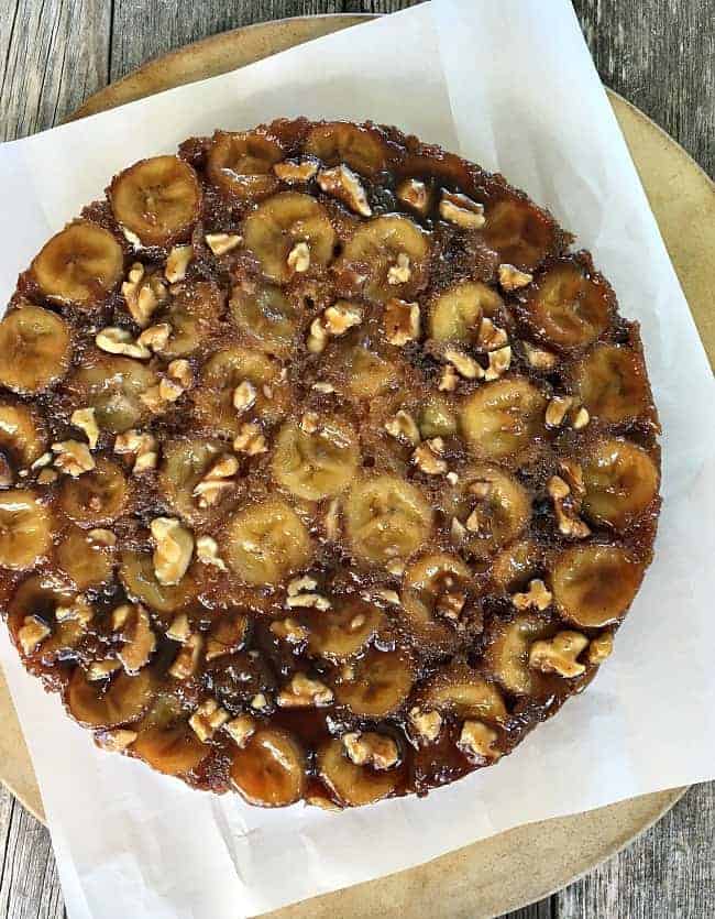 Top view of Banana Upside Down Cake with bananas and walnuts