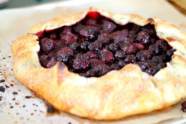 berry galette baked and cooling on baking sheet