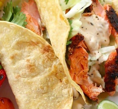 fish tacos with salmon on a plate