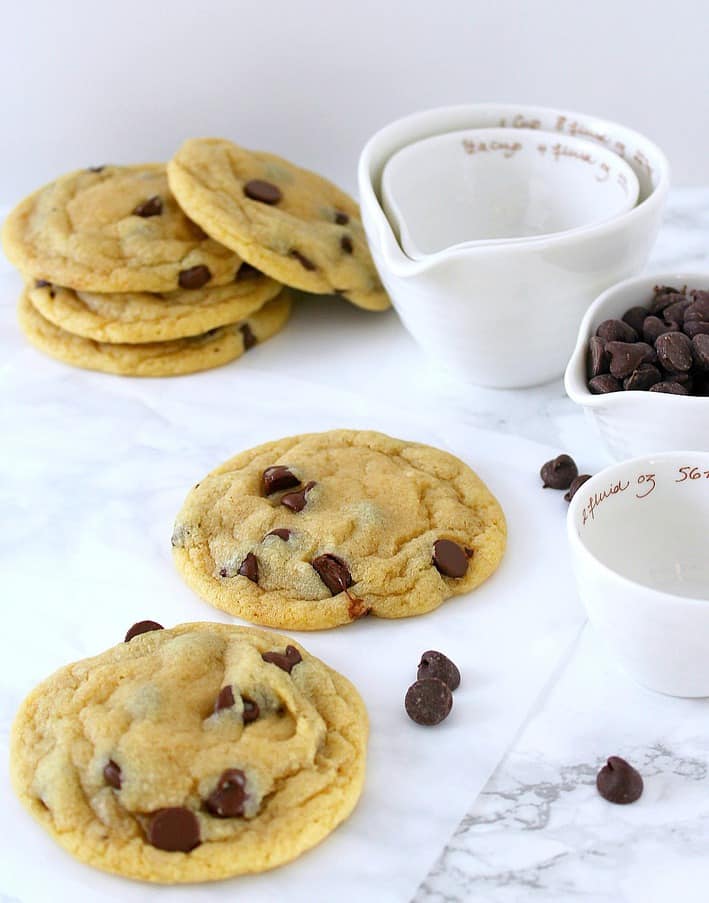 chocolate chip cookies, white measuring cups