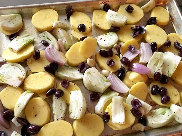 Potatoes, onions, olives, before baking