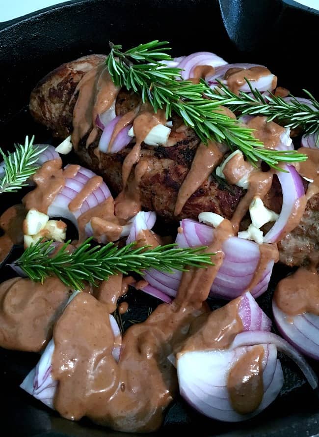 Pork Tenderloin with fig gravy, red onions and rosemary on top