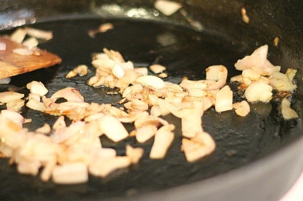 Chopped onions cooking in a skillet