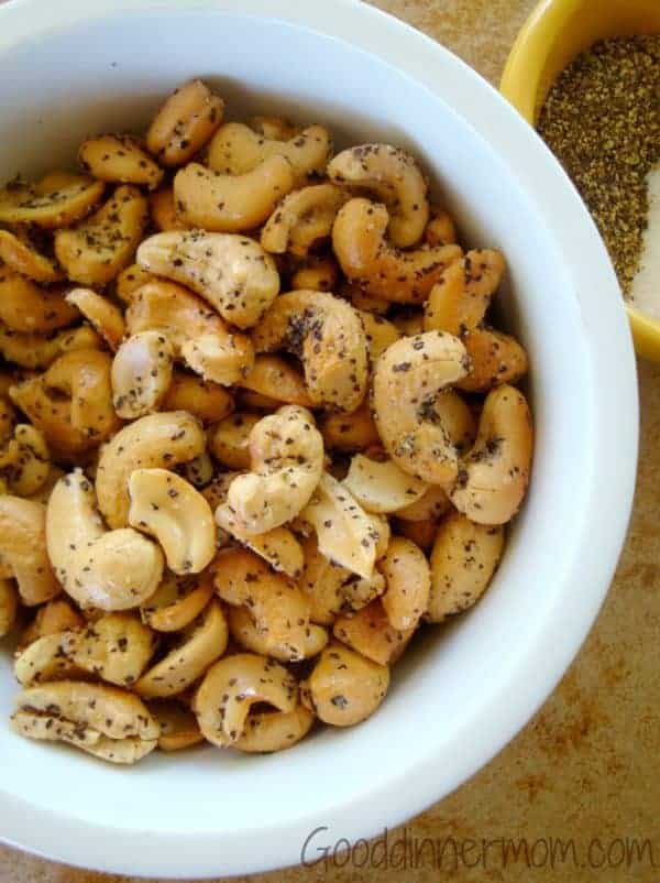 Cashews with salt and pepper in a white bowl